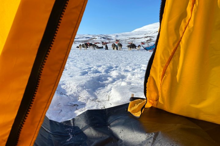 a person that is standing in the snow