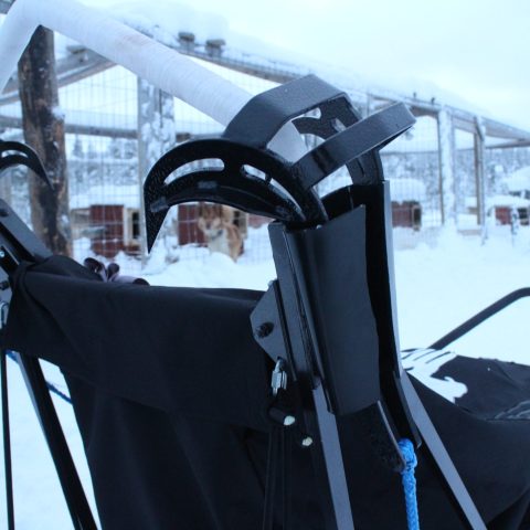 a bag of luggage sitting on the snow