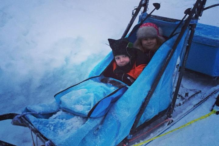 a person lying on the snow