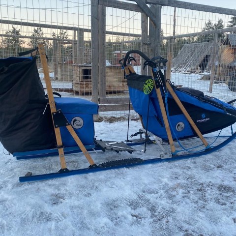a person that is standing in the snow