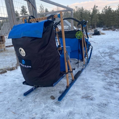 a person that is standing in the snow