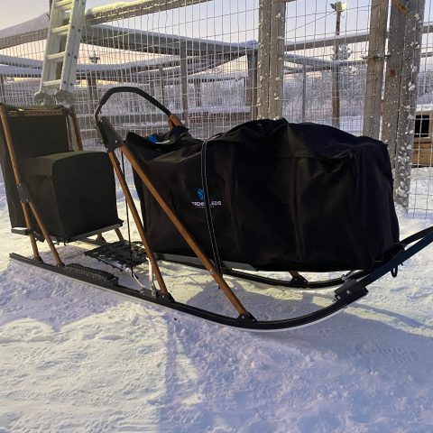 a bench covered in snow