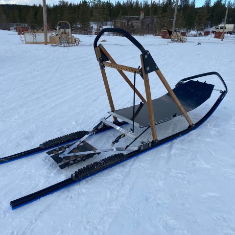 a person lying on the snow