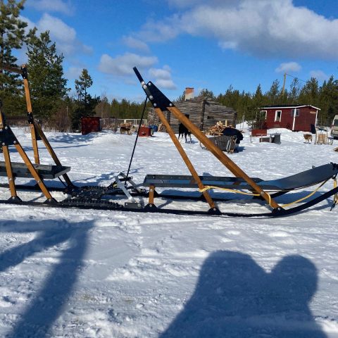 a group of people riding skis on top of a boat
