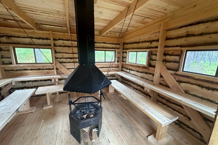 a chair sitting in front of a building